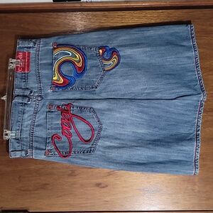Coogi Jeans repurposed into a lady's skirt